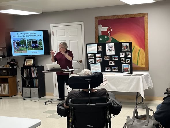 Pam Mailey, Recording Secretary, presenting about covered bridges at Dallastown Nursing Center, April 8, 2026